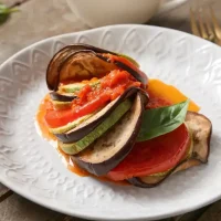Plate,Of,Tasty,Ratatouille,On,Wooden,Background